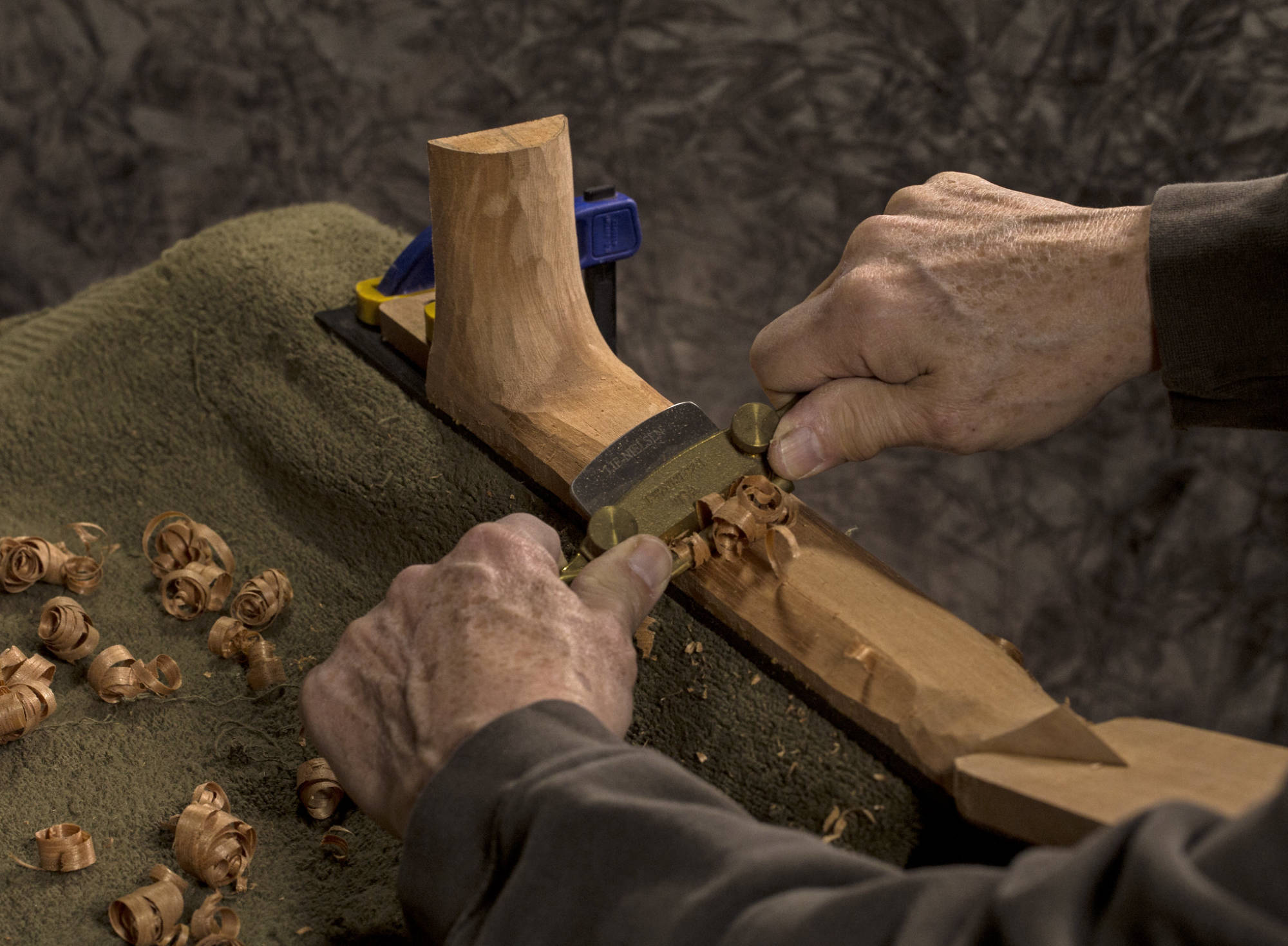 Hand carving Spanish Cedar neck